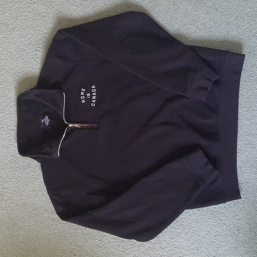Peace Collective Home is Canada 1/4 zip sweater
